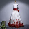 Neueste niedliche Juwelen-Blumenmädchen-Geburtstagskleider, Ballkleid, durchsichtiger Ausschnitt mit Spitzenapplikationen, günstige Festzugskleider für Kinder