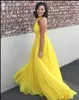 Vestidos de fiesta largos de gasa amarillo brillante 2018 halter ojo de cerradura espalda abierta vestidos de dama de honor vestidos de cóctel sexy vestidos de noche