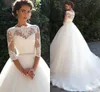 Mezze maniche in pizzo arabo vintage Una linea Abiti da sposa principessa Abiti da sposa principessa in tulle con perle lunghe a bateau con retro trasparente