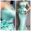 Mint Plus Size Prom Dresses Saudi Arabic Sheer Neck Appliques Lace Beads Mermaid Evening Dress With Peplum Feathers Women Formal Party Gown