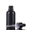 Wholesale Popular 10ml 15ml 20ml 30ml 50ml 100ml Black Glass Essential Oil Cosmetic Bottles With Pipette For Essence beard oil