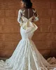 バックボウビーズ長袖ブライダルガウンナイジェリアのウェディングドレスを持つプラスサイズのアフリカの人魚の結婚式のブライダルドレス