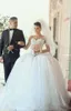 2019 Nieuwe bescheiden Arabische Baljurk Trouwjurken Plus Size Sweetheart Kant Applique Puffy Tulle Mouwloze Vloerlengte Formele Bruidsjurken