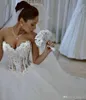 Ballkleid-Hochzeitskleider, herzförmiges Korsett, durchsichtig, bodenlang, Prinzessin-Brautkleider, Perlenspitze, Perlen, nach Maß212K