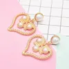 Pendientes de corazón de perlas doradas, diseño de moda, colgante de gota de perlas para mujeres y niñas, joyería de fiesta para vestido