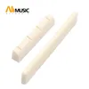 GetMusic 100pcslot plast sadel och mutter för ukulele uk 4 String Hawaii Guitar Parts Ivory7993568