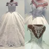 Crystal Ball Dresses Beade Sheer Neck Illusion Back Lace Applique Handmade Flowers Chapel Cap Sleeves Wedding Gown