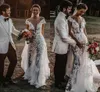 Robes de mariée romantiques en dentelle florale Illusion 2020 Bohemian Jewel Neck Overskirts Robe de mariée Sirène à manches courtes Robes de Mariee AL6234