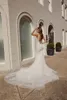 2020 Charmiga bröllopsklänningar Spaghetti Straps Lace Pärlor Sequins Brudklänningar Sexig Öppna Backless Sweep Train Mermaid Bröllopsklänning