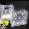 100pcs 18 * 25 * 10 cm Belle sac de cadeau floral épaissir le sac de transport en plastique Shopping, Emballage à emporter à emporter