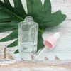 Flacone contagocce quadrato da 20 ml di olio essenziale Bottiglie di siero in vetro trasparente da 30 ml con tappo rosa per cosmetici