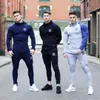 2019 الخريف الشتاء الجري مجموعة الرجال الرياضة الدعاوى هوديس السراويل مجموعات البلوز + sweatpants الرياضية الصالة الرياضية اللياقة رياضية ...