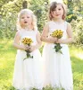 Leuke volledige kant land bloemenmeisje jurken voor bruiloften nieuwe boho mode kleine baby communiejurk een lijn formele kleding voor kinderen