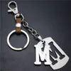 Capital Letter M Separerbart rostfritt stål Pendant Läder Keychains Charm Bag Hang Car Keyring 26 Letters Series Gift5508616