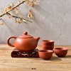 Natural Purple Clay Tea Set med 1 tekanna 4 tekoppar handgjorda Zisha Sand Chinese Kong Fu Teaware Authentic Yixing Gifts