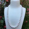Collana maglione pendente con accessori in zirconi con micro intarsio di perle coltivate d'acqua dolce bianche da 8-9 mm fatte a mano 55 cm