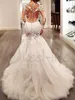 2021 Gorgeous Koronki Suknie Ślubne Syrenki Sheer Neck Dubai Afryki Arabski Styl Długie Rękawy Fishtail Suknia Bridal Plus Size Illusion Bors