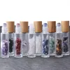 10 ml Klar glasrulle på parfymflaskan med naturlig kristallkvarts stenkristallkula Träkornskydd Essentiell oljekolv LX8428