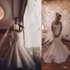 Afryki Tanie Syrenki Suknie Ślubne Jewel Neck Illusion Pełne Koronkowe Aplikacje Długie Rękawy Plus Rozmiar Tulle Sweep Pociąg Formalna Sukienka Bridal