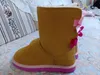 Topp Aus Classic Design Girl Pink Bow Short Snow Boot Women Popular äkta läderskor Fashion Women's Boots