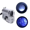 UVと2つのLEDライトフォーカス調節可能なジュエリールーペの拡大鏡が付いている60xズーム多機能顕微鏡ルーペ