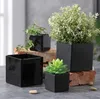 多肉植物鍋装飾的なファッションシンプルな白い黒い植木鉢プランターの多肉植物の家の装飾の3つのサイズ