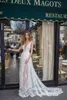 2020 Brautkleider mit tiefem V-Ausschnitt, Tüll, Spitze, Applikationen, seitlicher Schlitz, Strand-Hochzeitskleider, Knöpfe hinten, Sweep-Zug, Boho-Kleid