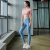 Nieuwe vrouwen fitnesspak uitgevoerd pak Cross T-shirt Gym Top Panty