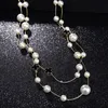 Grossist-designer lyx klassisk stil elegant fyrklöver pärla flerlager lång tröja statement halsband för kvinna