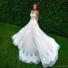 Floor length A-Line Applique Bridal Gown Vestido De Noiva Robe De Mariage High Quality Champagne and Ivory Sheer Top Wedding Dresses 2020 Ne