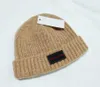 Bobble hoeden mutsen unisex cap de honderden gloednieuwe hoogwaardige winter hoed pom poms gebreide mutsen gemaakt van