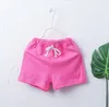 Barn designer kläder bomull toddler pojkar strand shorts godis färg tjejer sport trosor boutique sommar baby kläder 9 färger dhw546