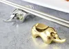 50 stücke Kreative Chinesischen Stil Geschenke Edelstahl Tier Goldene Silber Nashorn Stäbchen Gabel Halter Küche Geschirr Werkzeuge