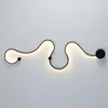 Lampy ścienne węża LED Nowoczesne minimalistyczne kreatywne oświetlenie Kreatywne Kreatywne akrylowe lekkie lampa Nordic Belt Sconce na grudzień