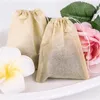 100 Pcs/lot sacs filtre à thé en papier outils de café avec cordon papiers non blanchis sac pour feuilles mobiles 6*8 cm