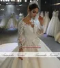 Abiti da sposa con sfere di pizzo di cristallo con scollo a V champagne chiaro Maniche lunghe musulmane aperte sul retro Abito da sposa taglie forti Immagini reali BC