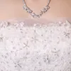 2019 Nieuwe Dubai Elegante A-lijn Trouwjurken Strapless Kant Applicaties Beaded Vestios de Novia Princess Bruidsjurken met knoppen