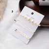 Hot New Pearl Metal Hair Clip Hairband Bobby Pin Barrette Tornante Accessori per copricapo Strumenti per lo styling di bellezza Gioielli per capelli per le donne