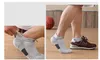 Chaussettes de basket-ball Elite Chaussettes longues pour hommes Chaussettes épaisses absorbant la sueur Chaussettes de course en plein air professionnelles