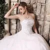 2019 New Dubai Elegant A-line Wedding Dresses Strapless Lace Appliques Beaded Vestios De Novia Princess Bridal Gowns with Buttons