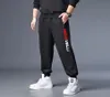 Spodnie męskie 7XL 6XL 5XL XXXXL Plus męskie spodnie do biegania Zipper Casual odzież sportowa dresy spodnie dresowe czarne siłownie Jogger1