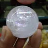 Кальцит 50mm ясный оптически с шариком сферы шпата Исландии радуг сладостным кристаллическим