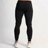 Nya män joggar casual fiess sportkläder bottnar mager sweatpants byxor manliga gym