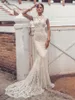 2019 Julie Vino Mermaid Bröllopsklänningar High Neck Lace Bridal Gowns Sweep Train Backless Abiti da Sposa Bröllopsklänning Plus Storlek