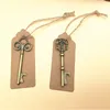 50st / lot antik brons metallskelett nyckel form flasköppnare med tag rustik bröllop souvenir dekor presentparty favör leveranser