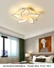 モダンなLEDの天井灯のアイアクリルシャンデリアランプ居間のベッドルームのお気に入りに照らされた完成したシャンデリア家の照明器具