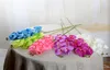 50個の人工花フェイクファラ​​エノプシスシルクフラワーファッションバタフライオーキッドブーケパーティー装飾ホテルウェディングホームデコレーション