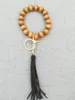 Perle en bois perlée à la main transfrontalière bracelet en corde élastique accessoires porte-clés pendentif gland