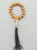 Cross-border hand-beaded wooden bead elastic rope bracelet keychain accessories tassel pendant