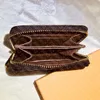 ZIPPY COIN PURSE M60067 مصمم أزياء المرأة قصيرة محافظ سستة المدمجة بطاقة عملة جيب حامل مفتاح الحقيبة المحفظة Pochette البني قماش